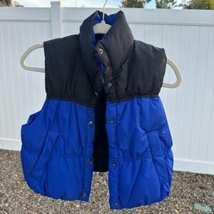 Divided black and blue vest